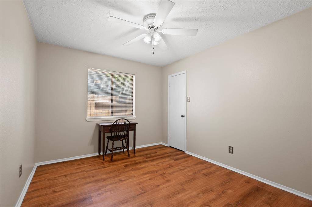 Bedroom 2 features newly installed LVP flooring and has a large walk-in-closet.