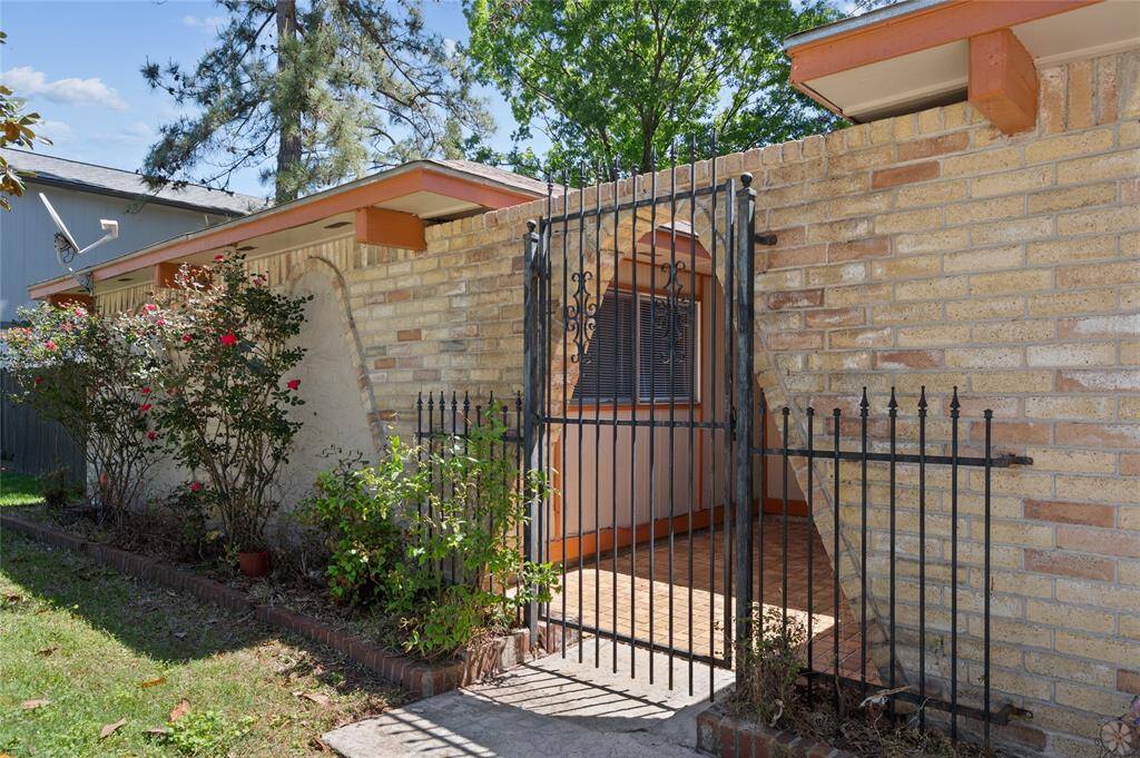 A unique tile courtyard welcomes you into this home.