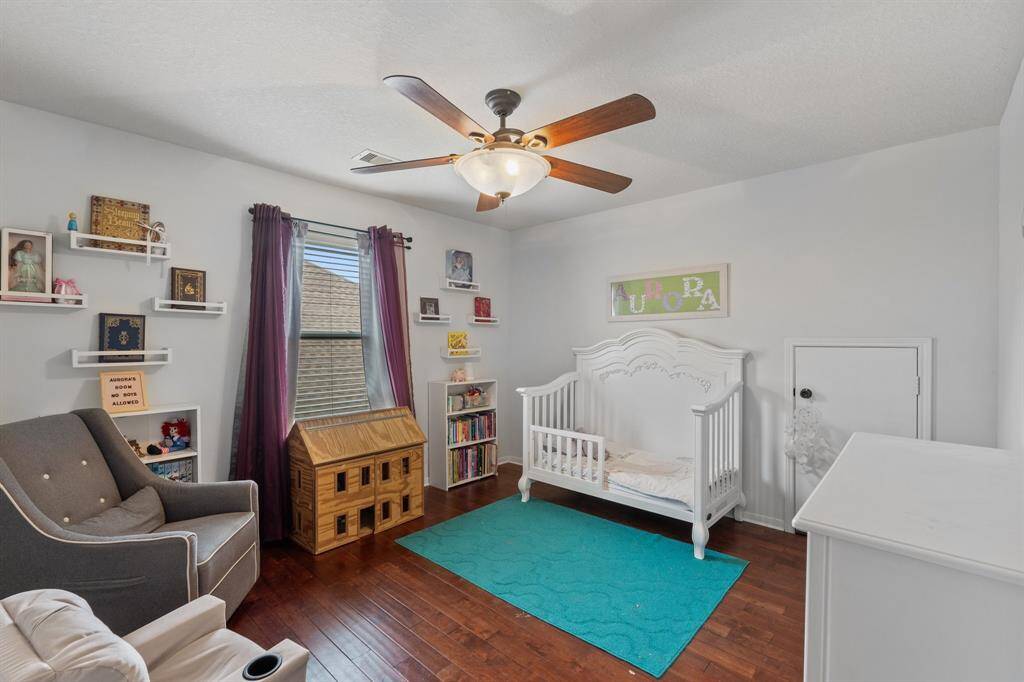 Bedroom 1 – Nursery:This cozy secondary bedroom is currently set up as a nursery, offering a quiet and comfortable space with room to grow.