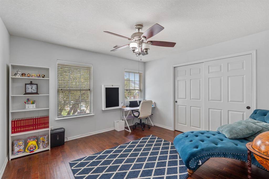 Bedroom 2 – Home Office:Bright and versatile, this bedroom is being used as a home office—perfect for remote work, studying, or creative projects.