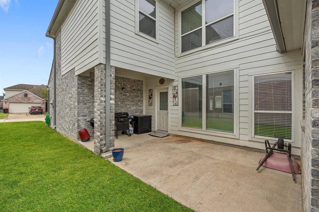 In addition to the spacious backyard with a concrete pad, this home also offers a rare bonus—a private side patio with its own exterior door. Covered and versatile, it’s the perfect spot for grilling, outdoor dining, or a cozy seating area. There’s plenty of room for a table with an umbrella, or it could easily be transformed into a serene garden nook. If not used for lounging, the space is equally ideal for storing outdoor tools, toys, or plant collections—flexible to fit your lifestyle.