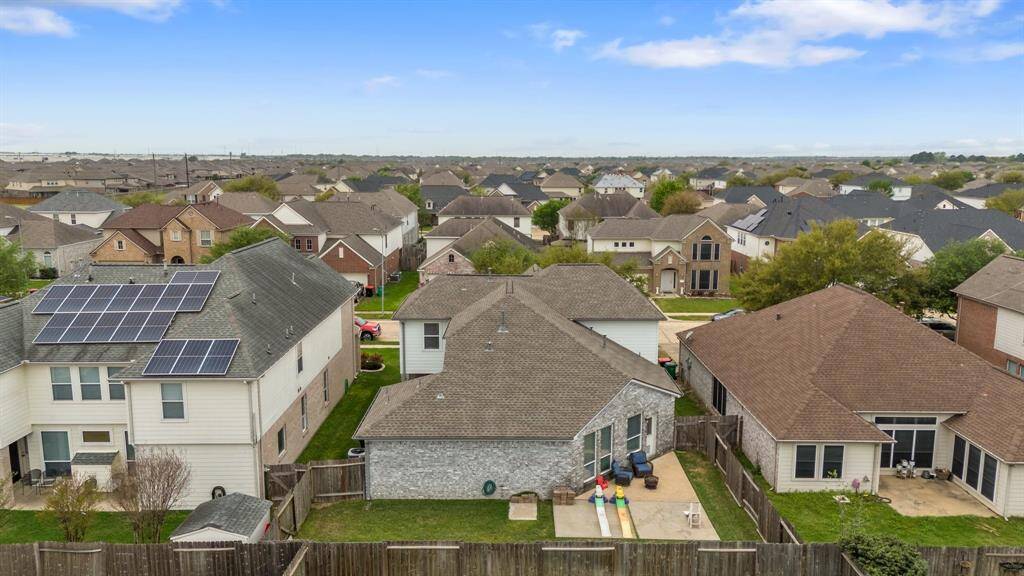 This aerial perspective showcases the full size of the yard, offering an abundance of outdoor space to enjoy, customize, or expand.