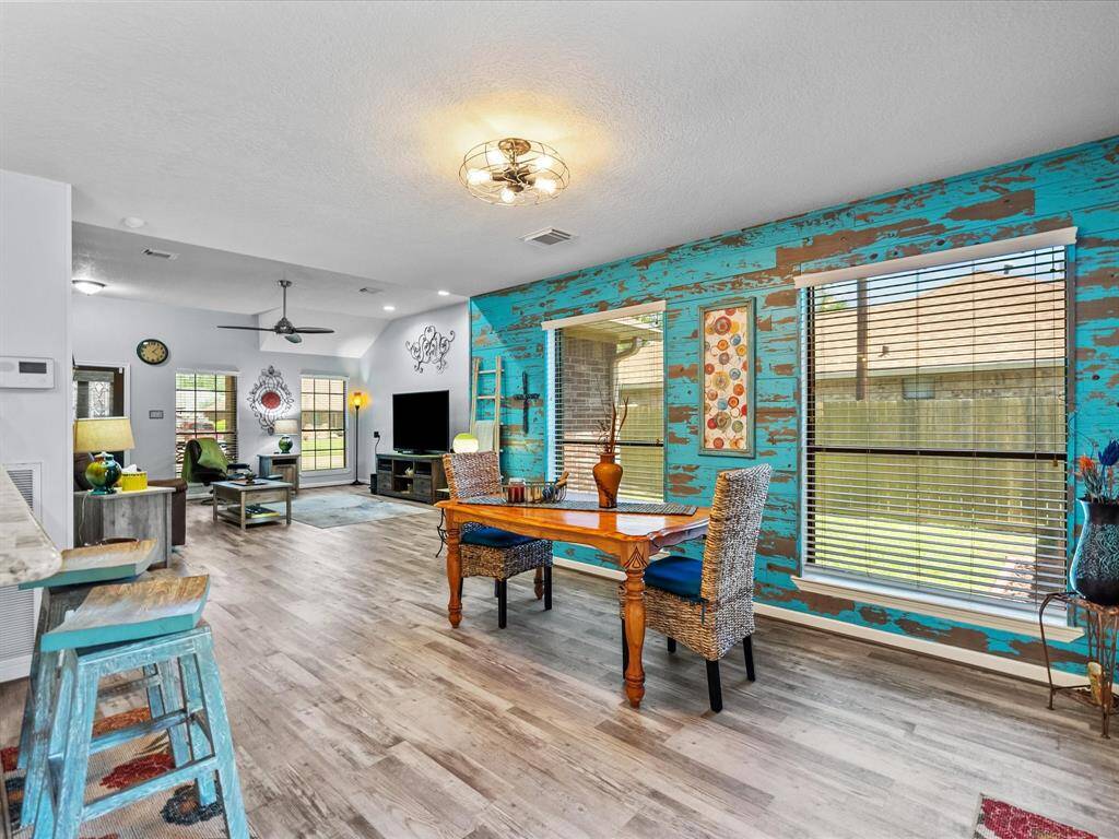 Again, two large windows lets so much natural light into the space. Pulling you to turn the corner and see the kitchen.