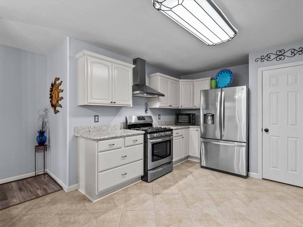 The stainless steal appliances set the stage for an upscale environment.