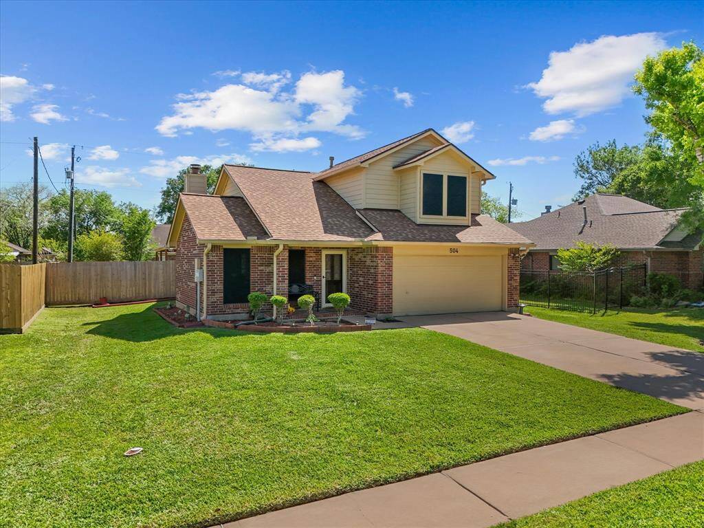 The large front yard is ideal for kids and adults alike.