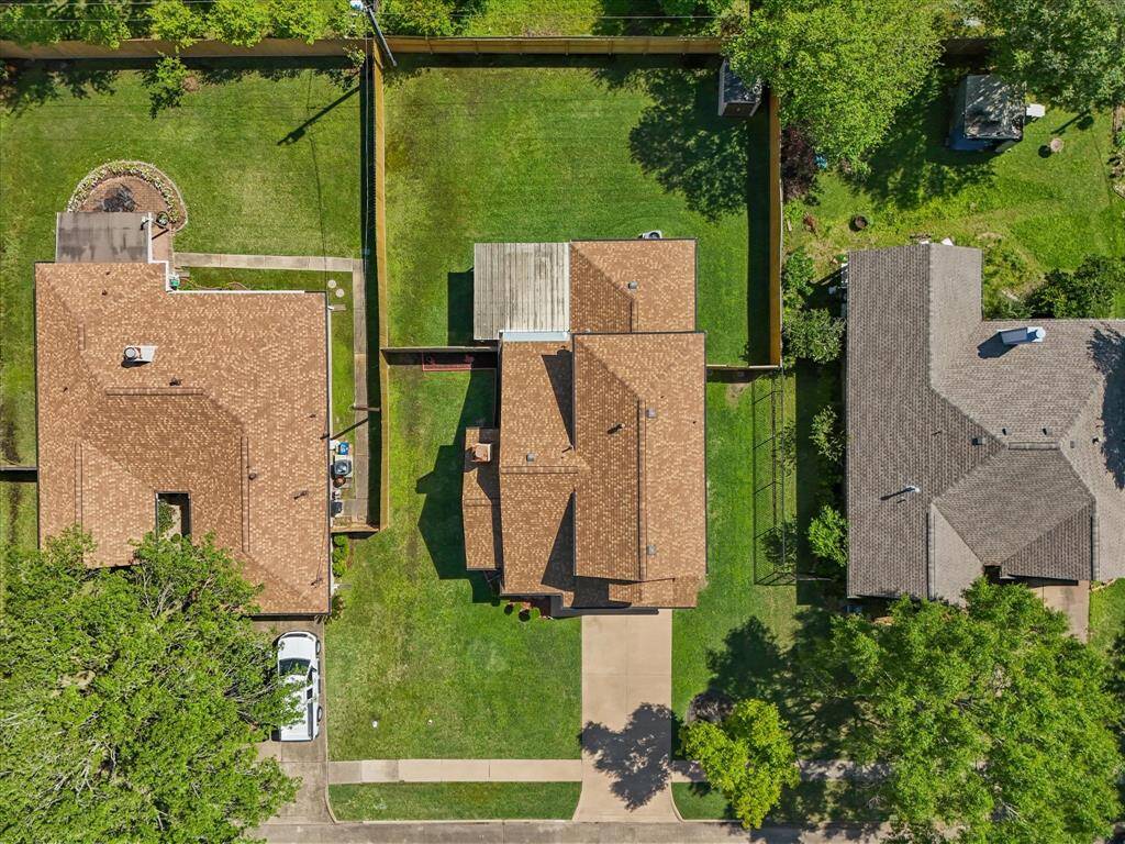 The back yard is ideal for a pool or having large backyard parties.