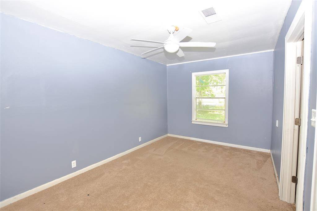A generously sized bedroom ready to be transformed into your perfect personal escape!