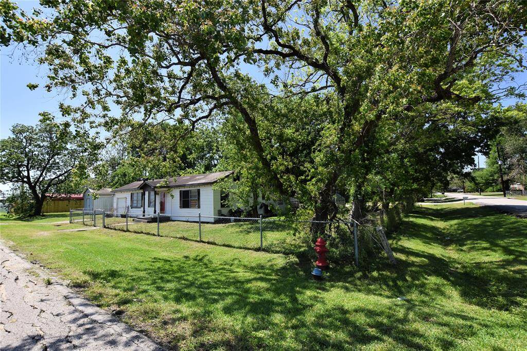 Nestled on a generous corner lot, this home offers plenty of space and privacy. Mature trees provide natural shade and a peaceful, park-like setting.