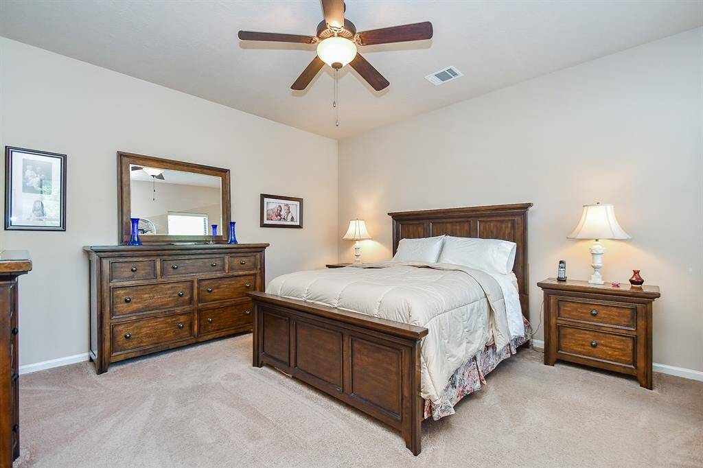 The kitchen has granite counters and stainless appliances.