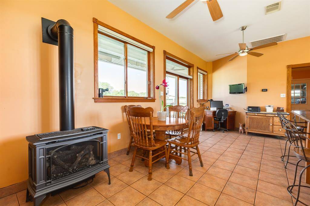 Breakfast area and gas stove fireplace