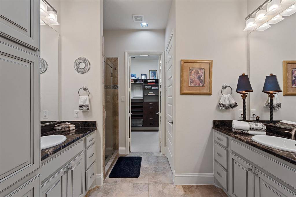 Luxurious primary bathroom well designed for comfort and functionality.