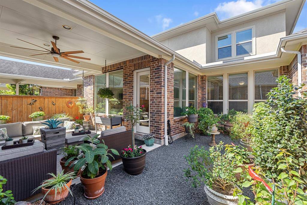Low maintenance backyard with some covered and uncovered spaces.