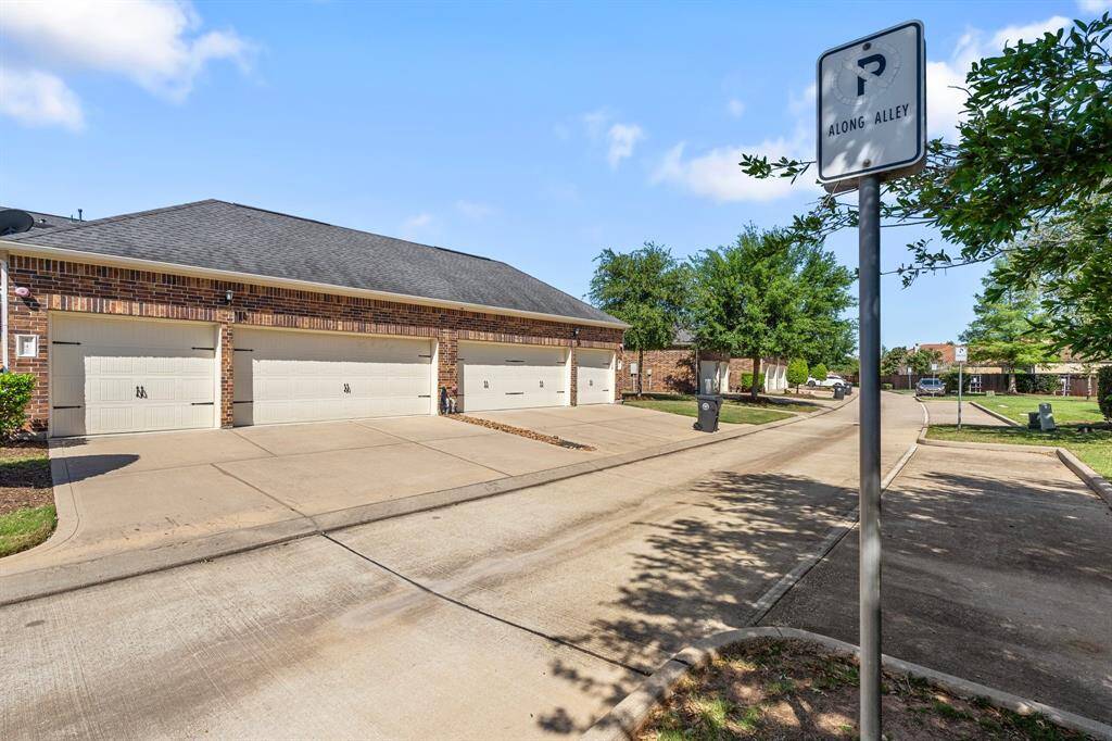 Back view of the home and access road to your three car garage.