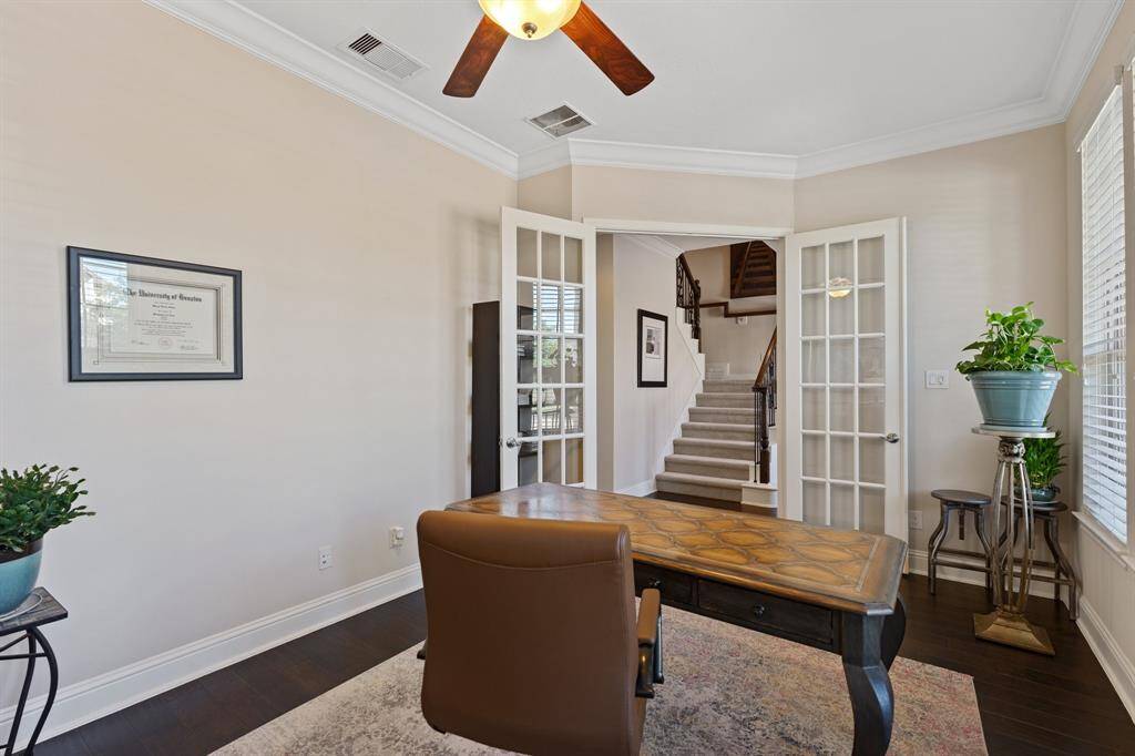 This private office can be closed off from the rest of the home with the double doors.