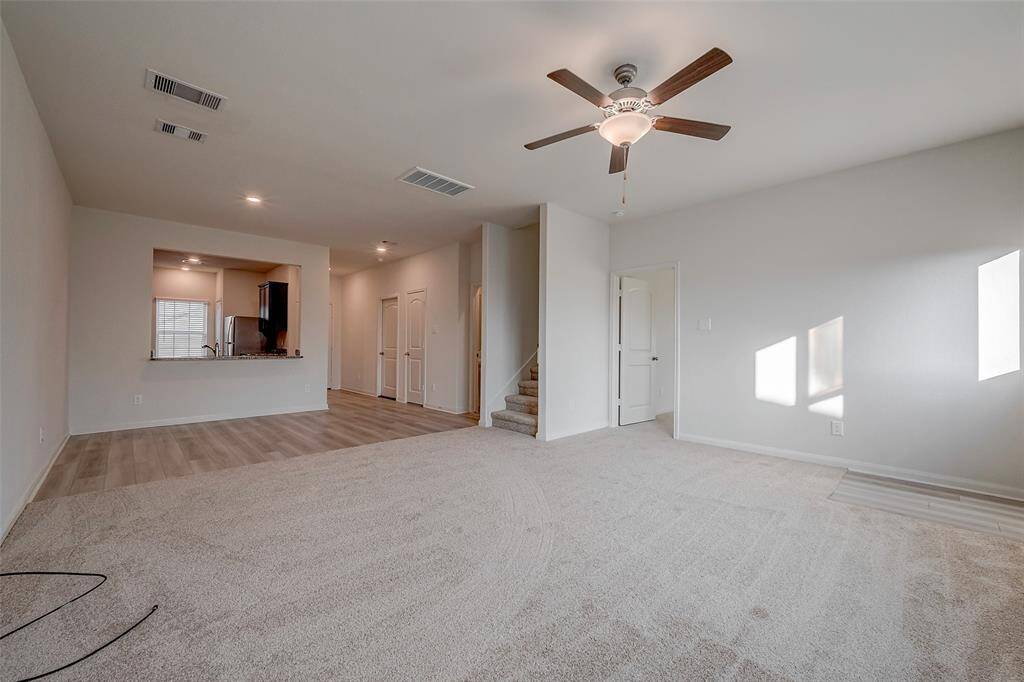The pass through bar in the kitchen creates a semi private space from the living area.