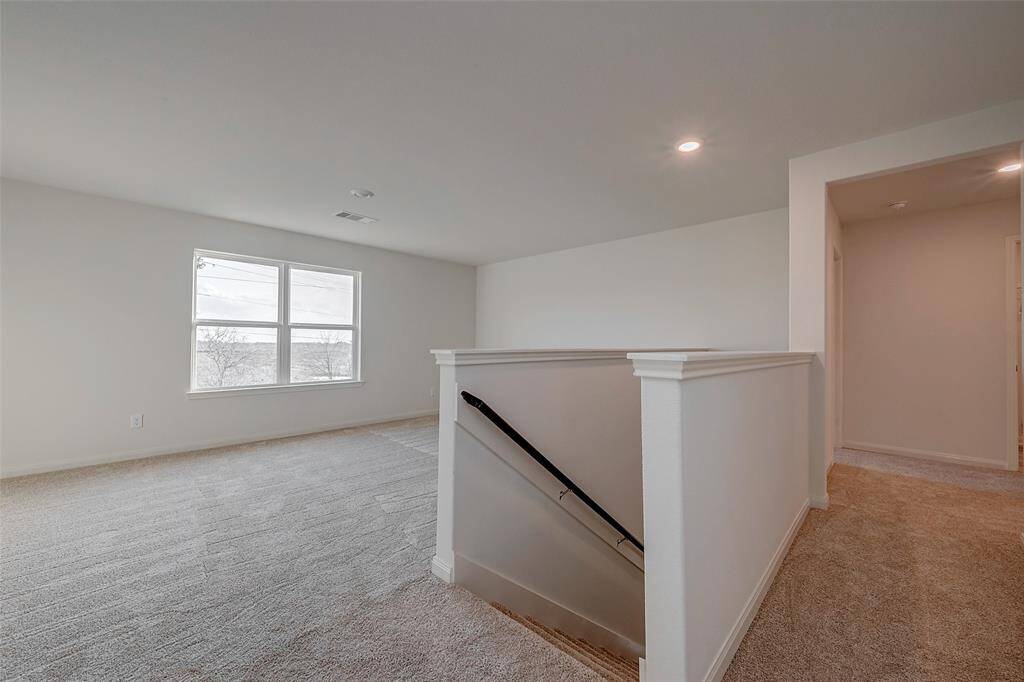 The stairs open to the large gameroom
