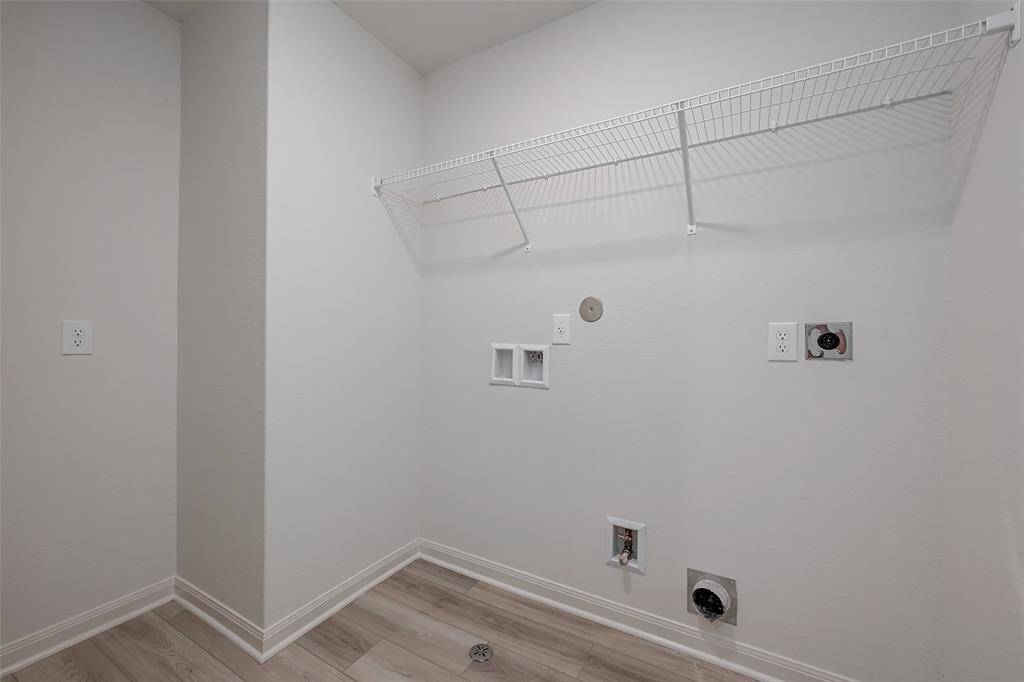 Laundry room is located upstairs.