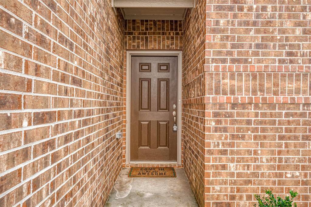 Covered entryway to protect your guests and packages from the weather!