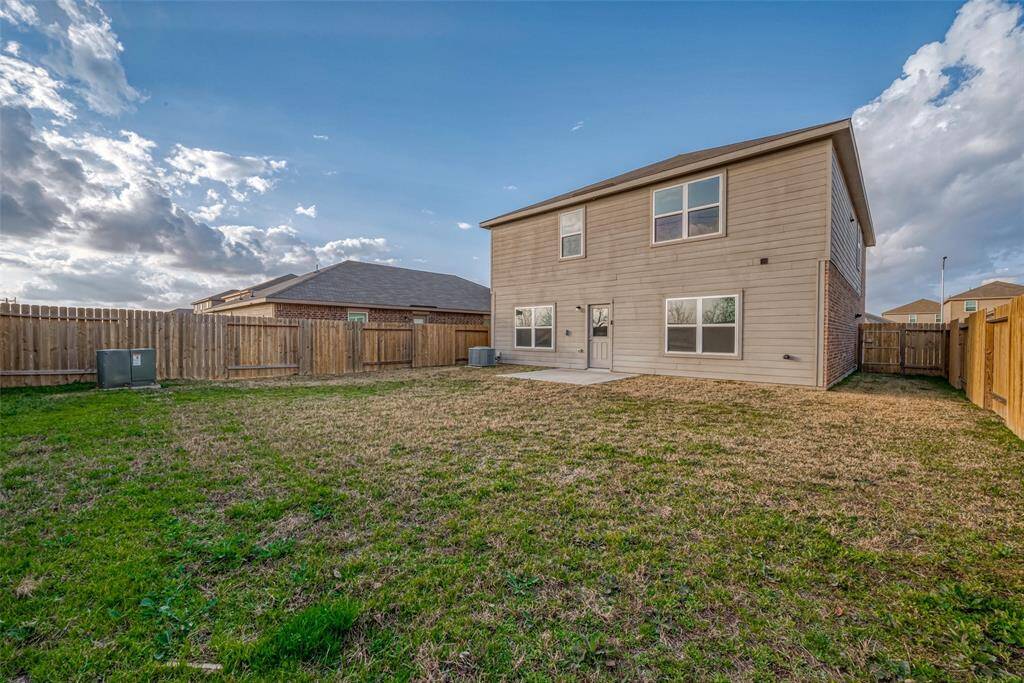 Plenty of room to spend some time outside in the private, fenced backyard.