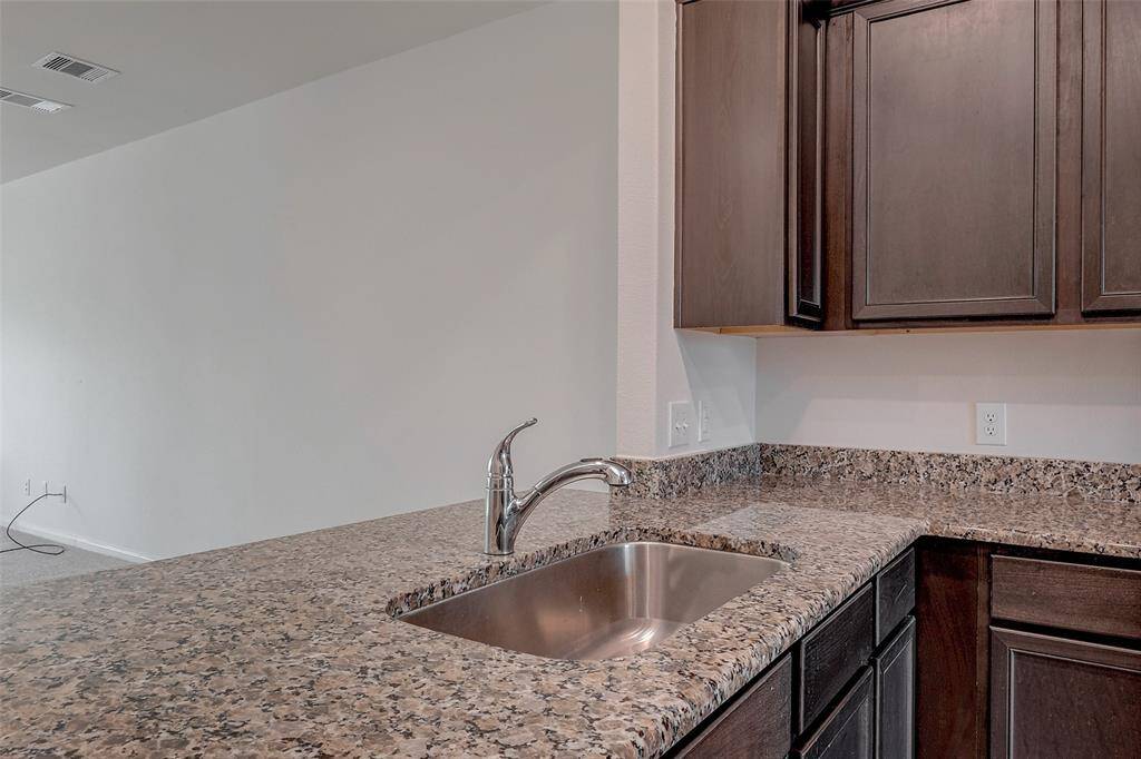 The kitchen is open to the dining and living area creating a great setup for entertaining.