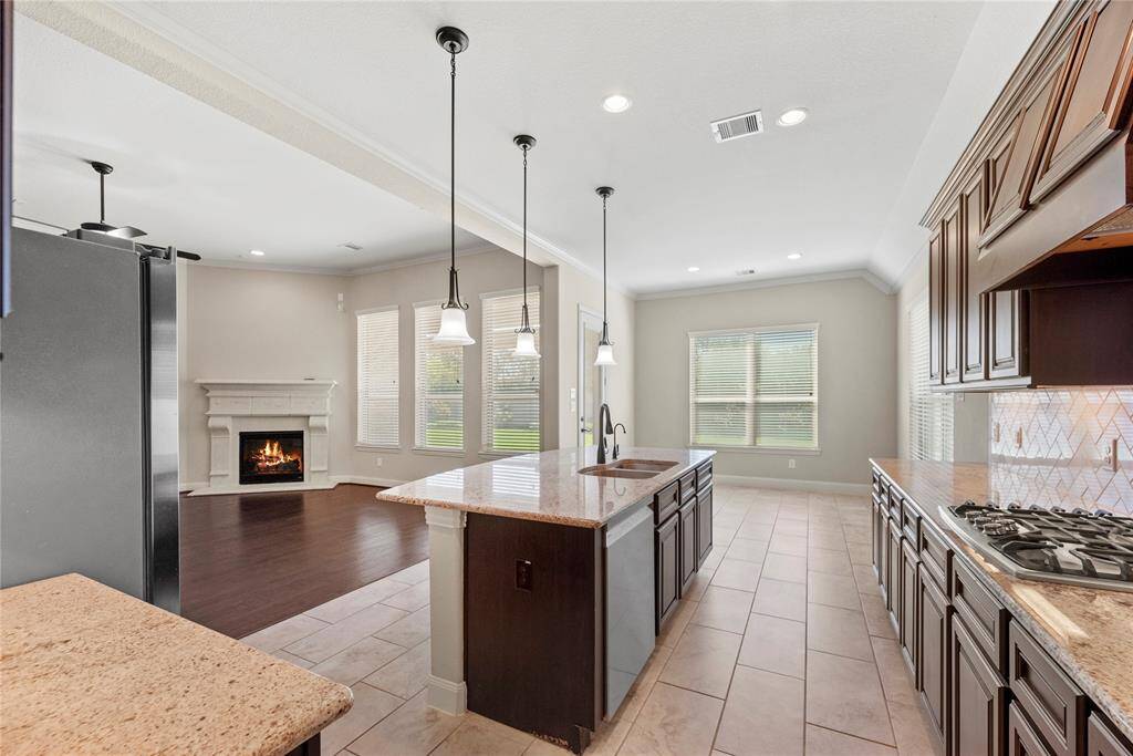 Overall, this chef-inspired kitchen combines style, functionality, and comfort to create a space that's both practical and beautiful—a place where culinary creativity can flourish, and memories can be made.