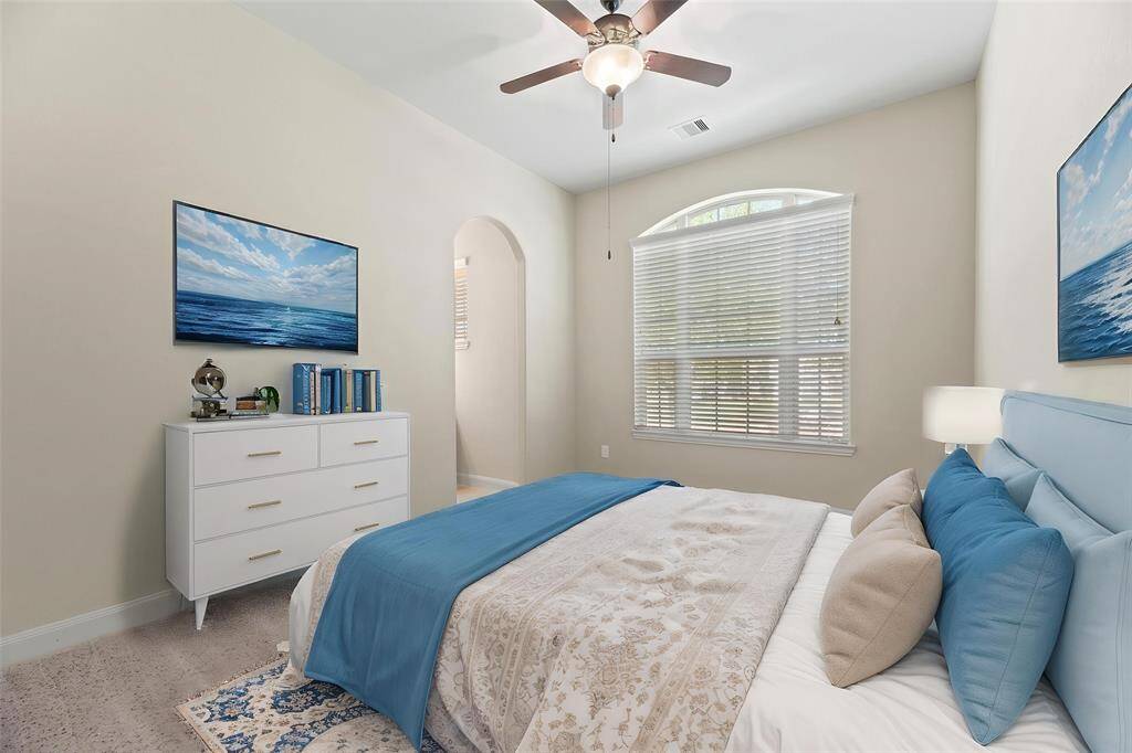 With ample room to accommodate various arrangements, your third bedroom can serves as a perfect retreat for family or guests. - virtually staged