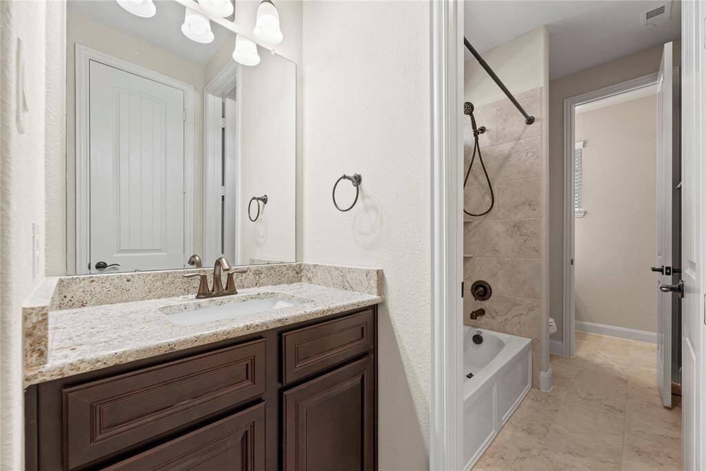 Each bedroom has a convenient secondary ensuite bath, offering added privacy and comfort—ideal for guests or multigenerational living.