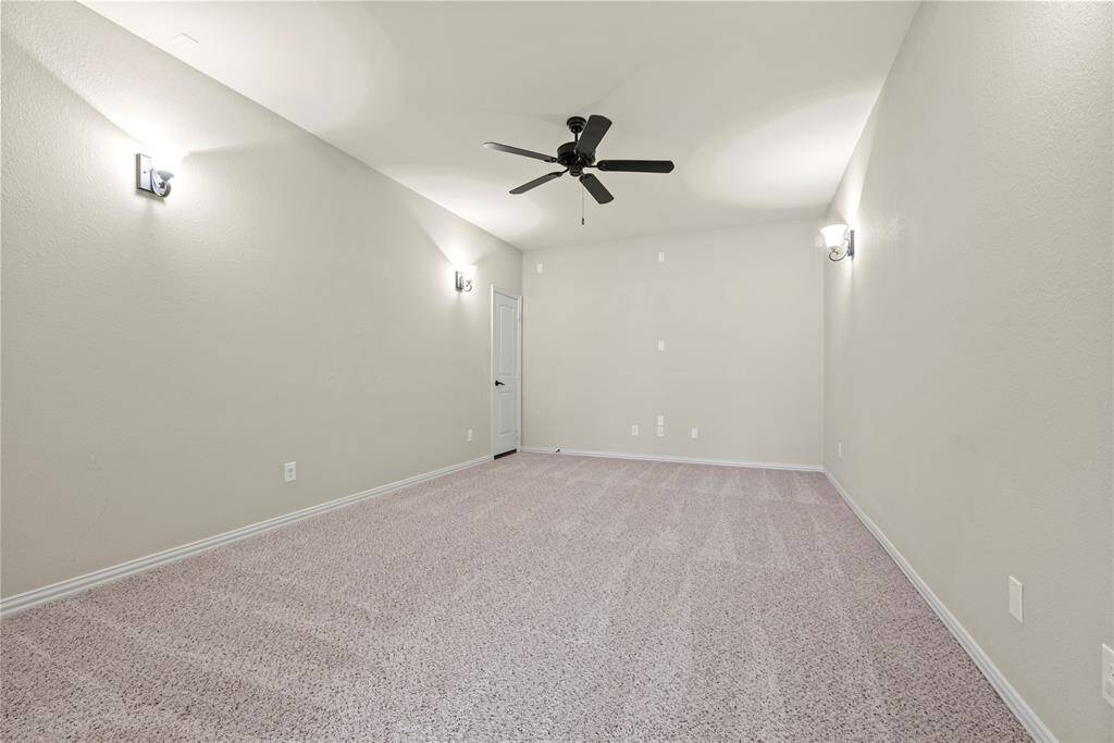Pop some popcorn, it's movie night! The upstairs media room is prewired for sound, making it an ideal space for an immersive home theater experience.