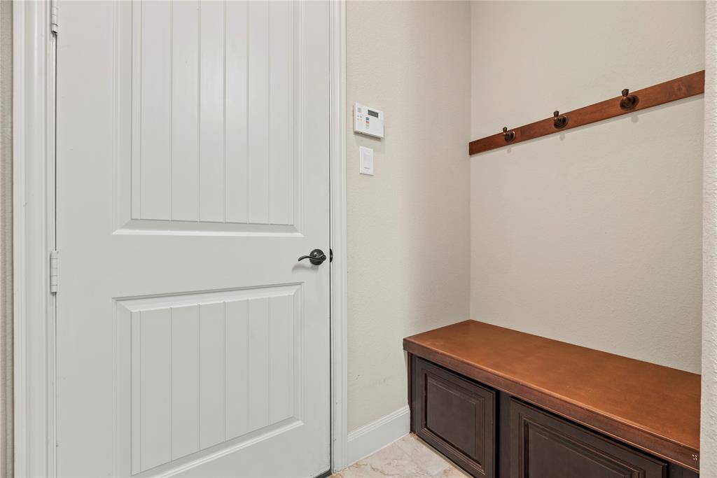 This mud room simplifies the coming and going of the family and keeping everything organized.