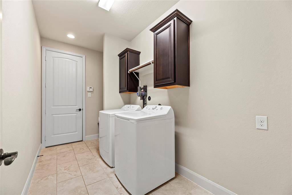 Experience convenience with the in-house utility room, thoughtfully designed with a dedicated laundry area. Large enough for a full size fridge or freezer.