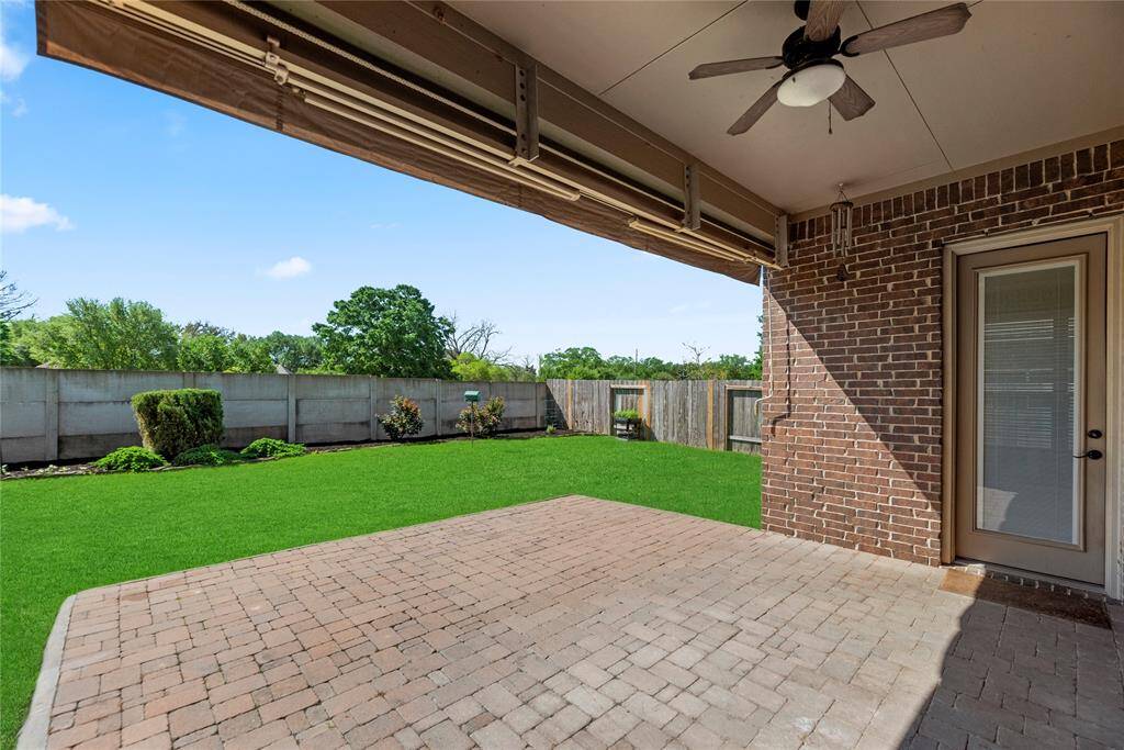 The extended covered patio with manual awning, is an easy place to sit back and watch the sunset or just get some "you time" in the fresh air.