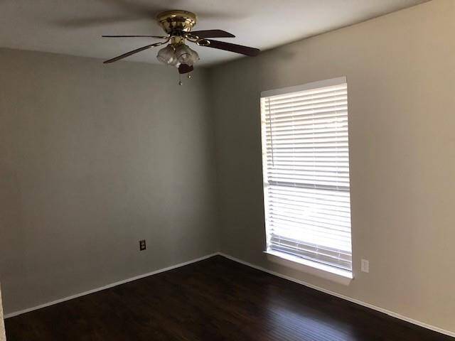 Formal dining with new mini-blinds and plank flooring
