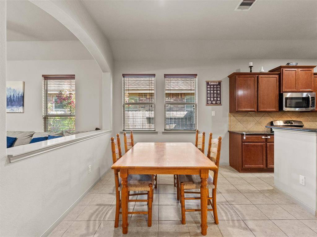 The dining area allows you to be close to family or guests, even if you are working in the kitchen.