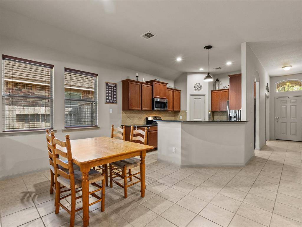 The kitchen and dining area are at the heart of this home!