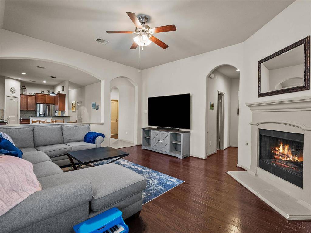 Relax for a movie night or the big game in this open concept space.