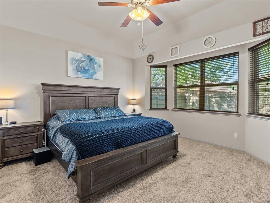 The primary bedroom offers plenty of space for a complete bedroom suite AND lovely bay windows!