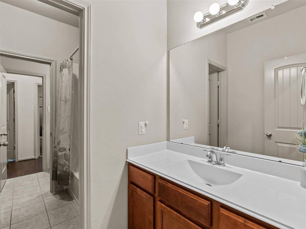 The secondary bedrooms utilize a Hollywood bath--a perfect solution for sharing a bathroom.