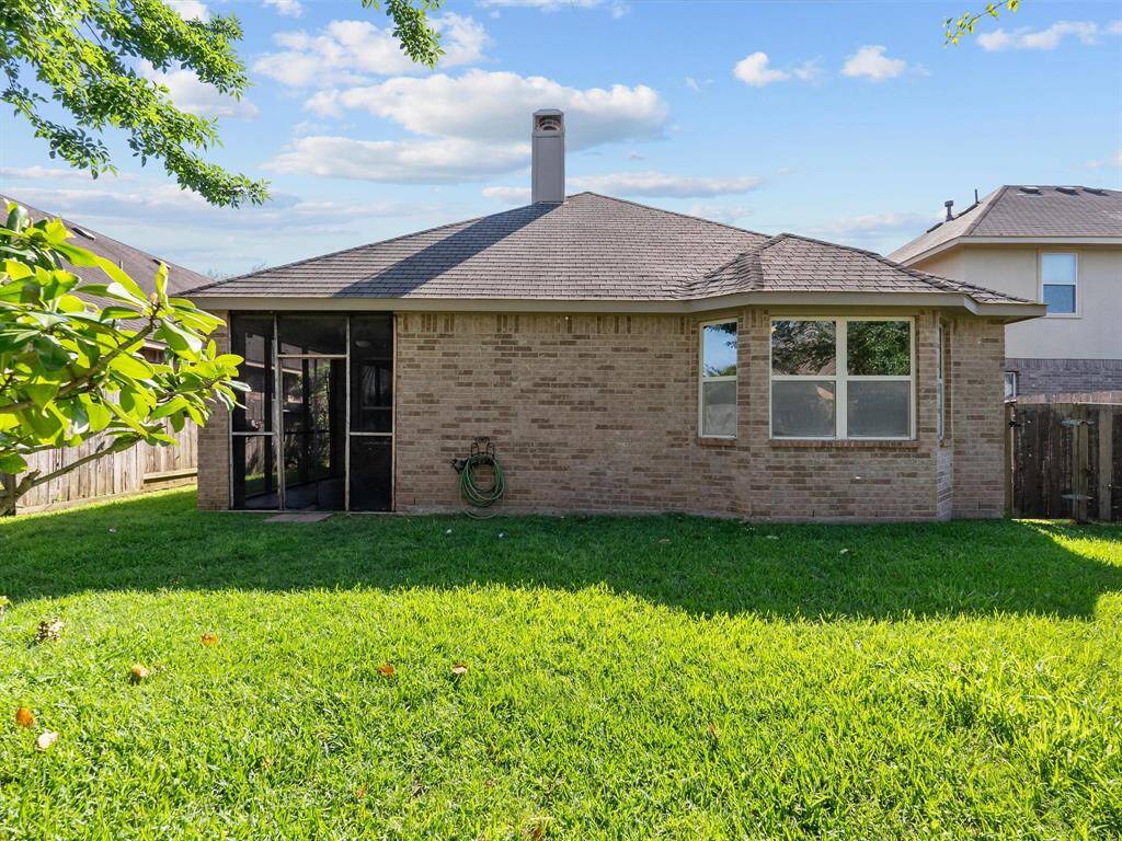 There is an additional gated space on the side of the home that would be a great area for storage.