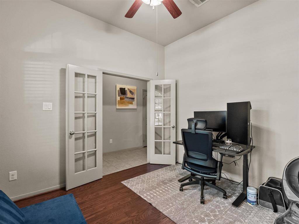 Elegant French doors create a quiet workspace & a place for concentration.