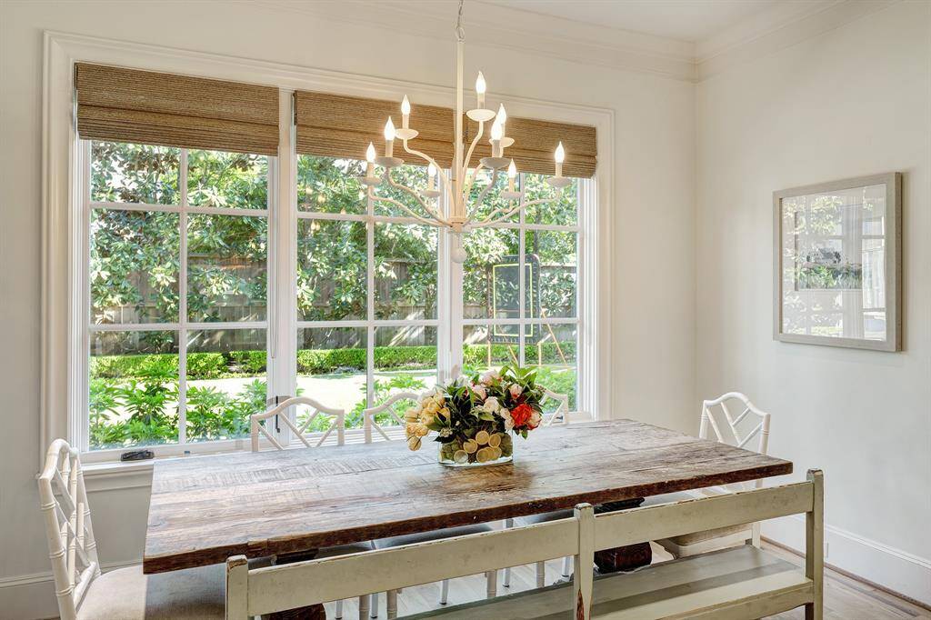 Breakfast room has large window overlooking the backyard.
