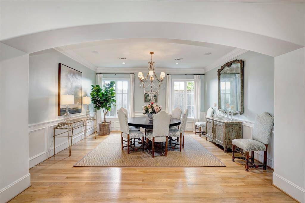 Spacious formal dining room is ideal for hosting both family gatherings and elegant dinner parties.