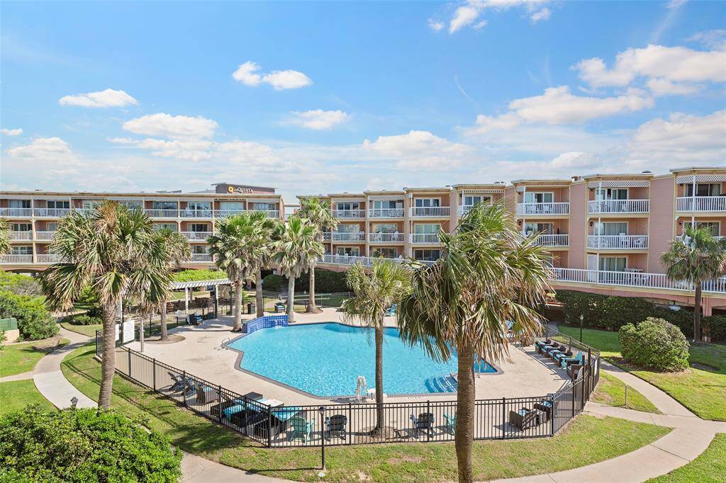 Experience the ultimate convenience with a heated pool just steps from your condo in this vibrant community.
