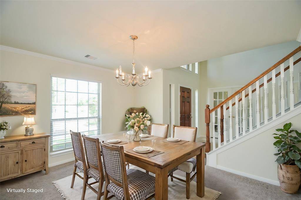 Virtually staged dining room.