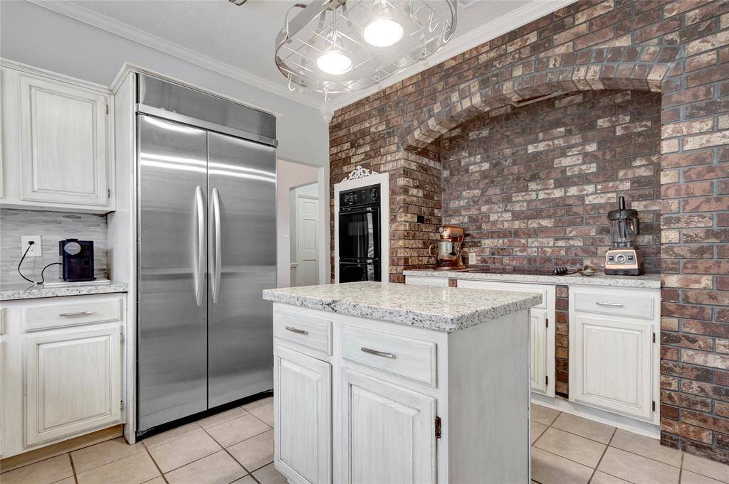 Commercial style built in Kitchen Aid fridge