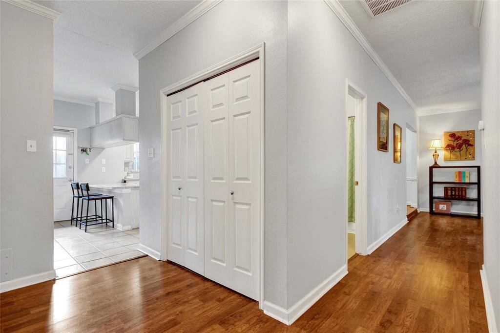 Laundry area conveniently located in the center of the home