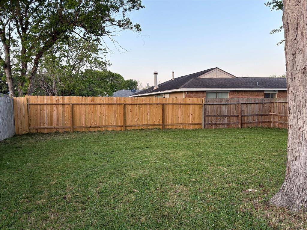 Huge backyard with new fence