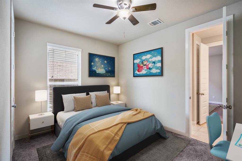 The final of the secondary bedrooms with plush neutral carpet, natural light, and spacious closet. *This room has been virtually staged