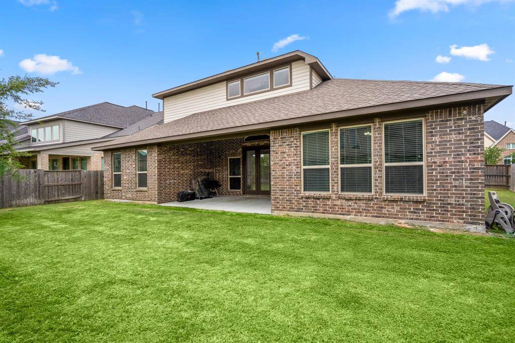 Enjoy the outdoors in this spacious and low-maintenance backyard! With plenty of room for play, gardening, or relaxing, this private outdoor space is the perfect blank canvas to make your own.