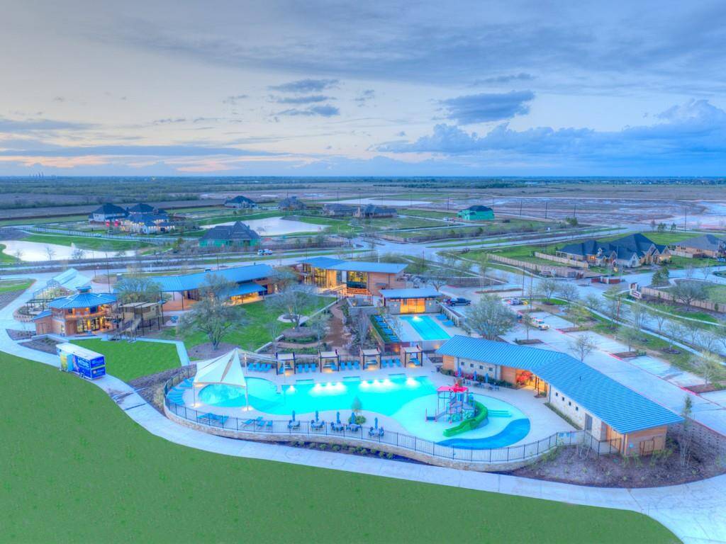Here is the amazing Cane Island Amenity Center where you will find a resort style pool, additional lap pool, fitness center, park, greenhouse, treehouse, and a neighborhood restaurant!
