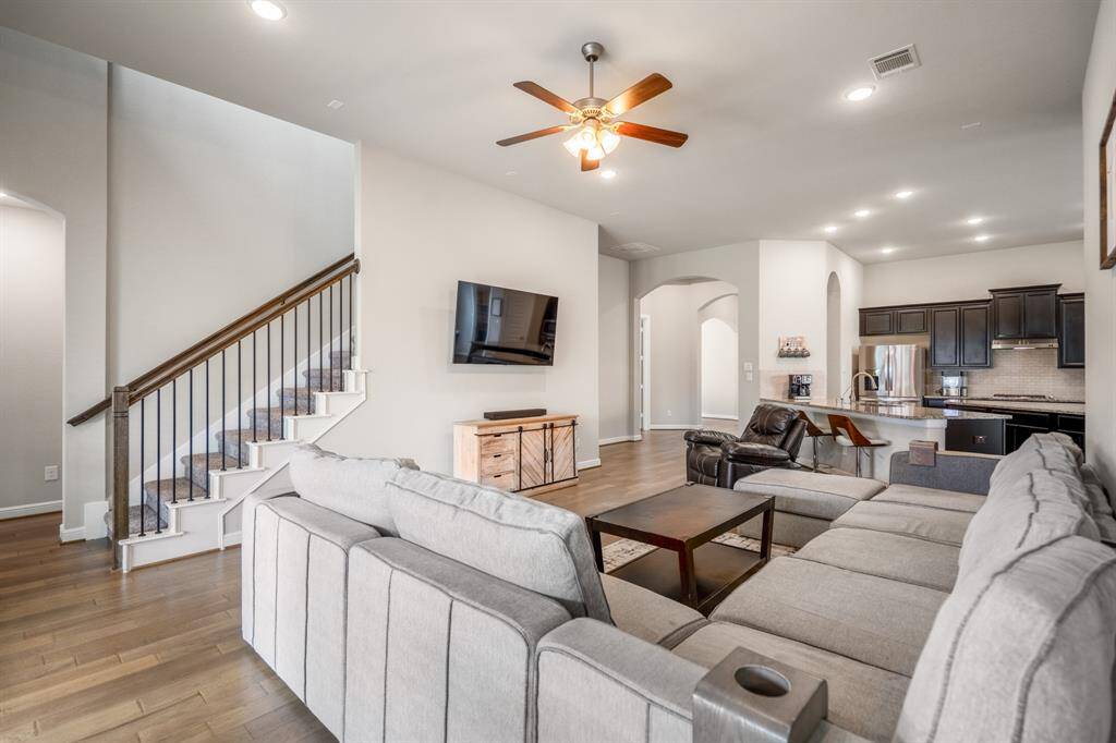 Whether it's a simple night in or entertaining family and friends, this home has ample open space for everyone to enjoy! This room can fit any size tv making it great for the next big game or movie night.